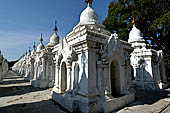 Myanmar - Mandalay, Kuthodaw Pagoda. 729 white pitaka pagodas contain the Tipitaka, the sacred texts of Theravada Buddhism. 